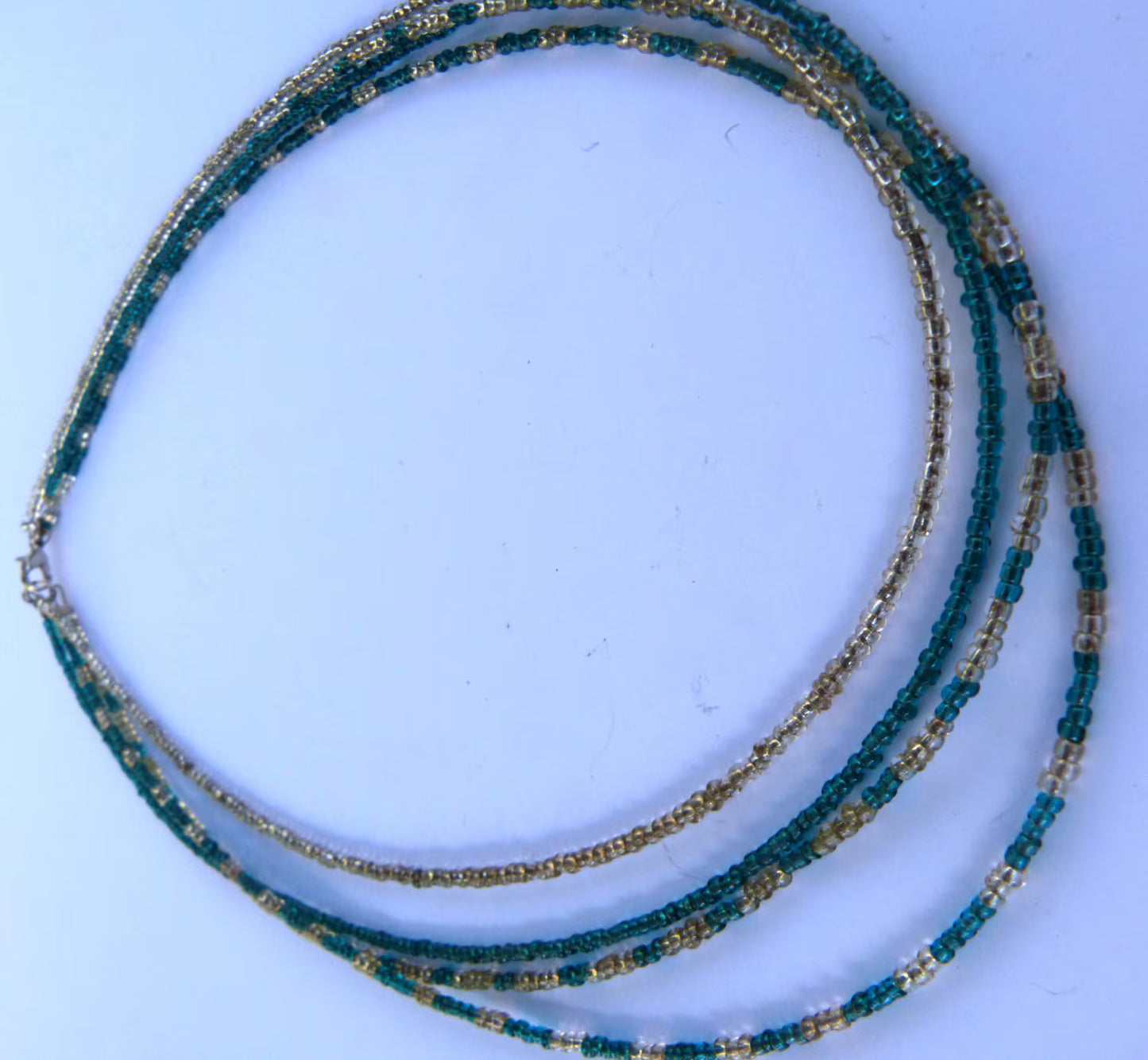 4 Strand Teal & Clear Seed Bead Necklace