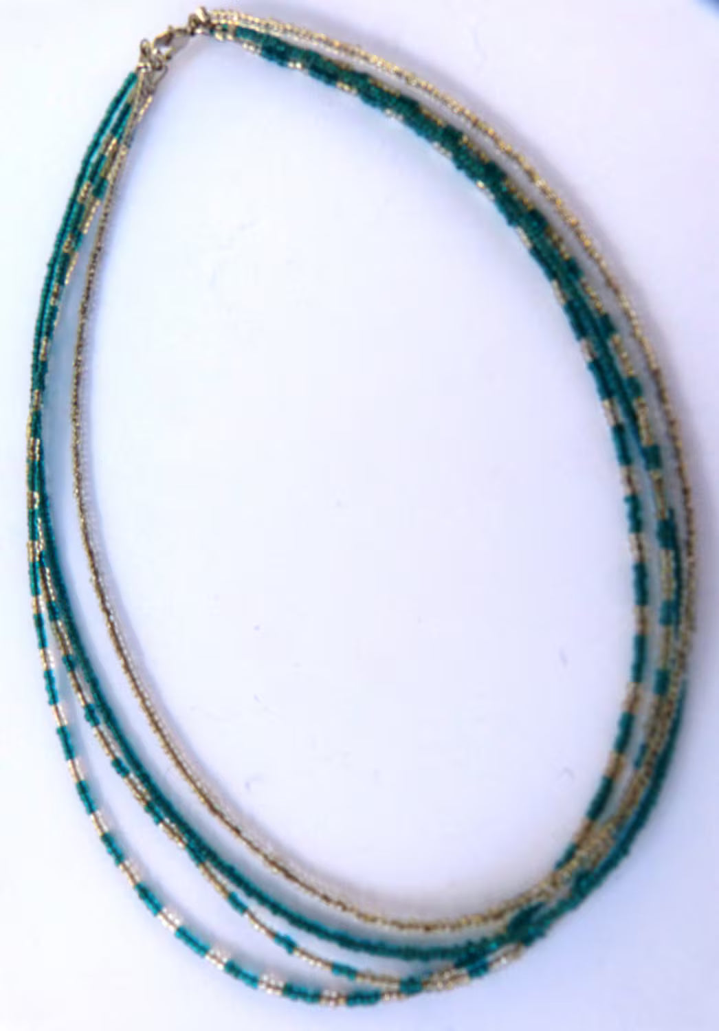 4 Strand Teal & Clear Seed Bead Necklace