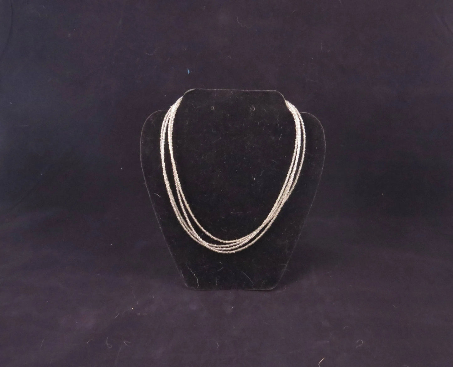 4 Strand Clear Seed Bead Necklace
