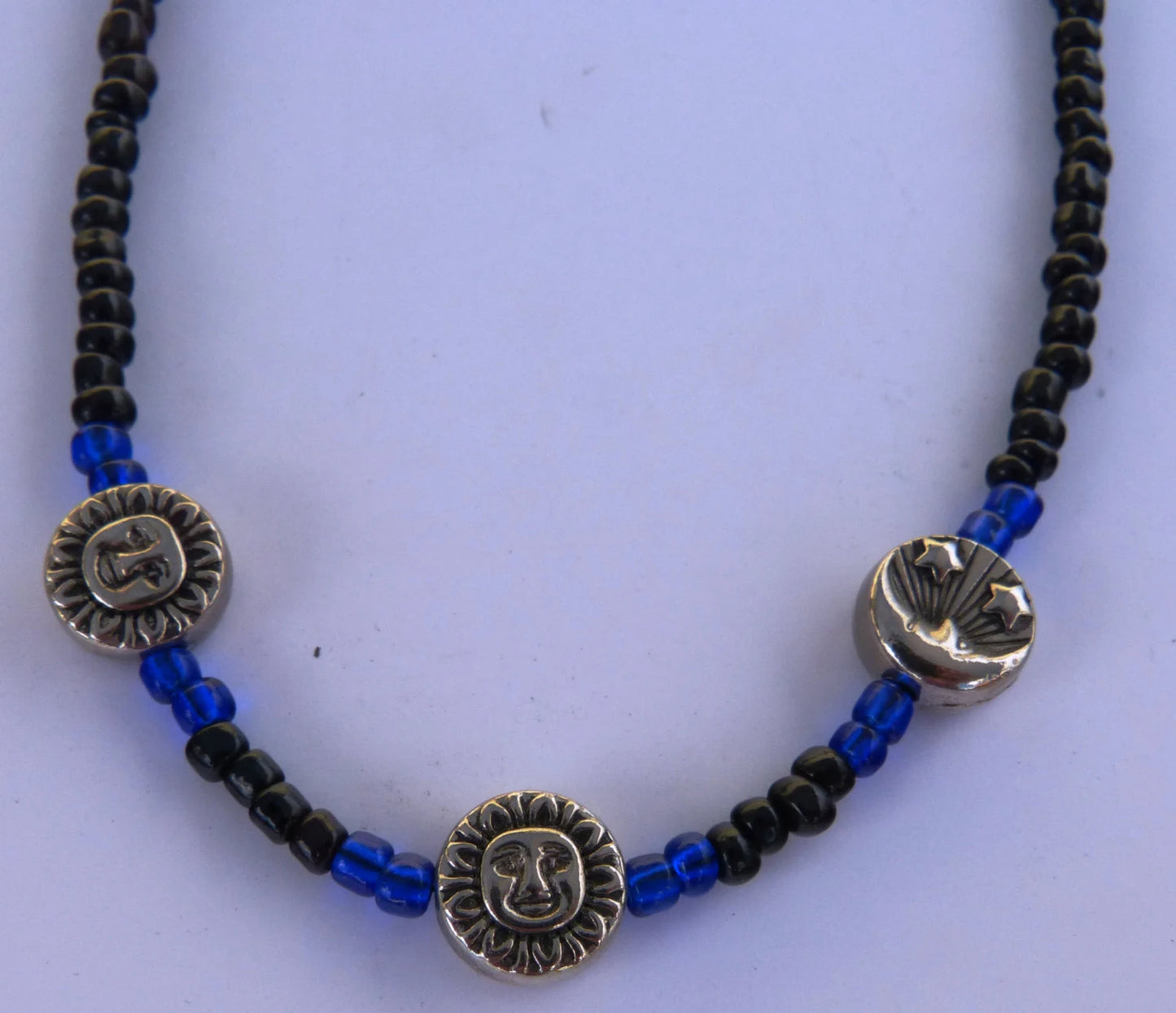 Blue & Black with sun & Moon Accents